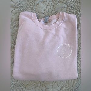 Olive & June limited edition pink sweatshirt